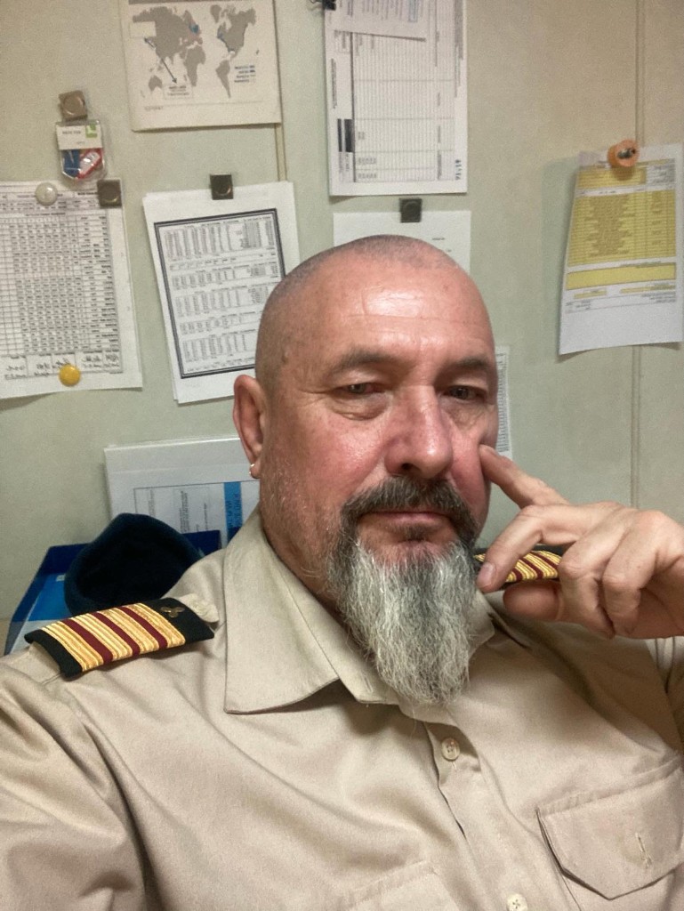 Chief engineer in uniform — Kragel Marine field engineering