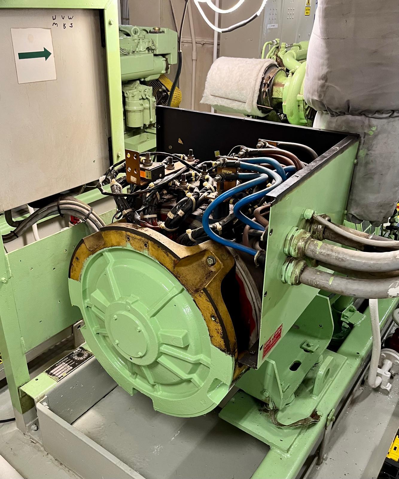 Open marine generator or motor housing with phase wiring